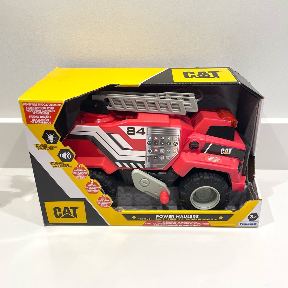 NEW CAT Power Haulers Toy Fire Truck w/ Realistic Lights & Sounds